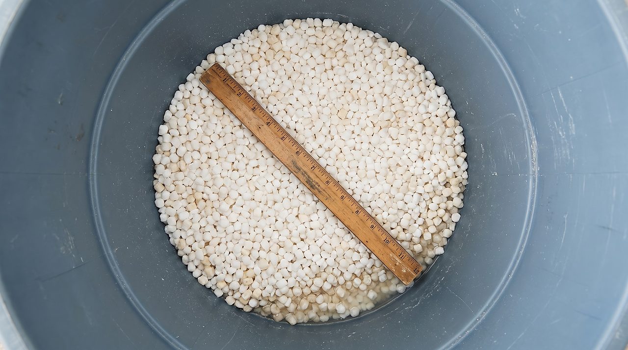 brine tank salt filled to roughly half its interior wall height